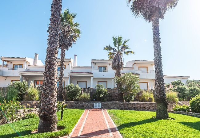 Maison mitoyenne à Amoreira - Golfe e Praia: Casa Familiar em Praia D´el Rey Maison mitoyenne à Amoreira - Golfe e Praia: Casa Familiar em Praia D´el Rey